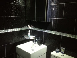 Black bathroom suite tiles